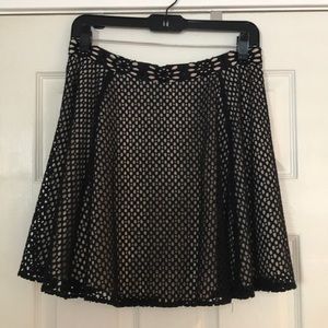 Beaded black lace skirt with tan lining . Not worn